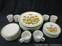 Full set showing stacks of dinner plates, salad plates, saucers and cups
