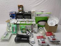 Group shot showing all boxed and loose lighting items, flashlights and timers