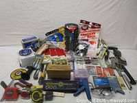 Overall view of assorted tools, accessories and packaged items