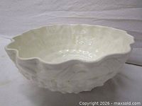 Top view of white embossed porcelain serving bowl