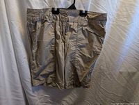 Front view of light khaki Jacob quick-dry shorts showing pockets and overall condition