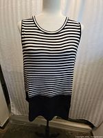 Front view of Michael Kors striped sleeveless top on mannequin