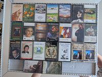 All 23 cassette tapes arranged in rows with cases visible