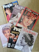 Six of the eight Royal Family magazines laid out