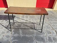 Full view of console table showing top, frame, shelf