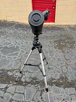 Full view of telescope front on tripod