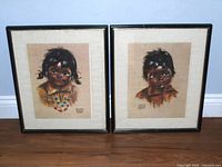 Both framed Audrey Young Oppel Indigenous children prints shown side by side