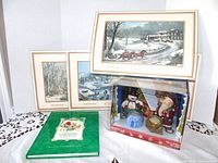 Overview of all items: four placemats, songbook, boxed diorama