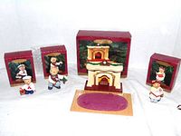 All four ornaments and their boxes visible