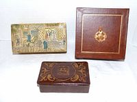 All three leather-covered boxes grouped