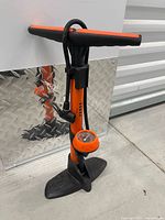 Full view of Gobko floor pump showing handle, hose, gauge, foot base