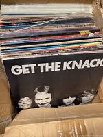 Top view of box showing stack of records; front album Get The Knack visible