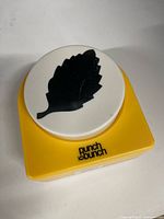 Top view showing Punch Bunch branding and leaf icon