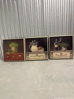 All three paintings side by side