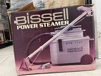 Front of retail box displaying Bissell Power Steamer image