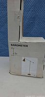 Front of IKEA BAROMETER lamp box showing product image and model name