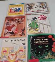 All six picture books laid out showing covers