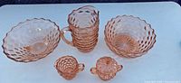 Entire set: pitcher, serving bowl, nested dessert bowls, creamer, sugar bowl with lid