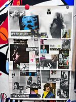 Full view of folded Beatles White Album poster showing entire collage