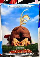 Full view of poster pinned to board showing artwork and overall condition