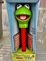 Front of boxed giant Kermit Pez dispenser