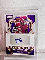 Front view of autographed Nolan Ray SAGE Sneak Peek card in holder