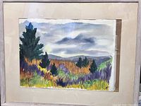 Full view of framed watercolor landscape