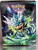 Front of Pokémon TCG binder with Eternatus artwork