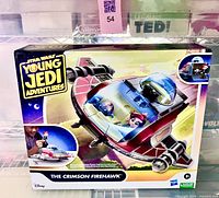 Front view of sealed box showing The Crimson Firehawk toy and Young Jedi Adventures branding