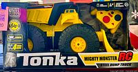 Front of boxed Tonka Mighty Monster RC steel dump truck showing truck and controller