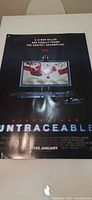 Full view of Untraceable poster front showing imagery and text