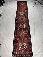 Full view of Gharajeh runner rug showing overall design and proportion