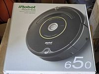 Front view of sealed retail box showing iRobot Roomba 650 image and branding