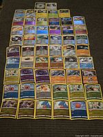 Full spread of all Pokémon cards laid out