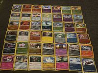 Full layout of all 48 holographic Pokémon cards