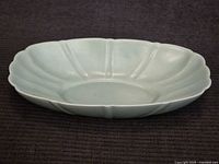 oblique view of pale green oval Bauer dish