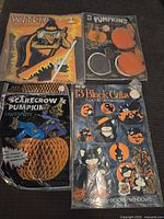 Overview of all four sealed Halloween decoration packages