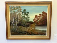 Front view of framed painting showing entire artwork, frame, mat