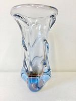 Full view of vase standing upright showing shape and color