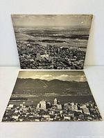 Front view of both mounted aerial photo prints