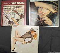 Front covers of the three The Cars albums Heartbeat City, The Cars, Candy-O