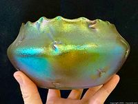 Front view showing iridescent dimpled bowl
