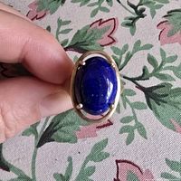 Front view showing oval lapis lazuli stone and setting
