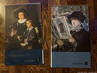 Both calendars front covers showing artwork and general condition