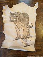 Full hide showing entire tiger illustration on leather