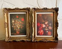 Front view of both framed floral prints side by side
