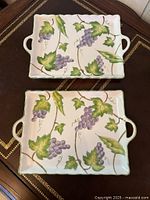 Two Andrea by Sadek Wild Grapes trays on table