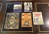 Overview of five books on desk