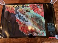 Poster overall view with satellite image and black borders