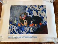 Full poster held flat showing image and text